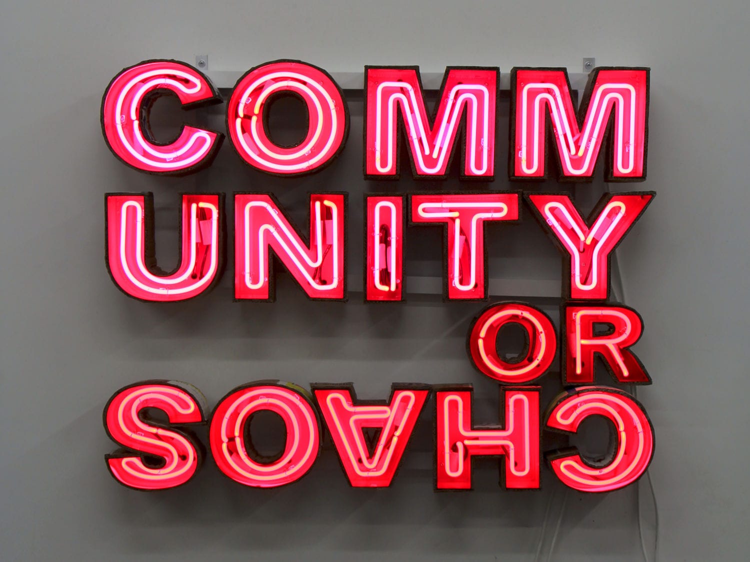 Andrea Bowers, Community or Chaos, 2016. Aluminium, cardboard, paint, and neon. 36 ¼ × 47 ¾ × 7 in. McEvoy Foundation for the Arts.